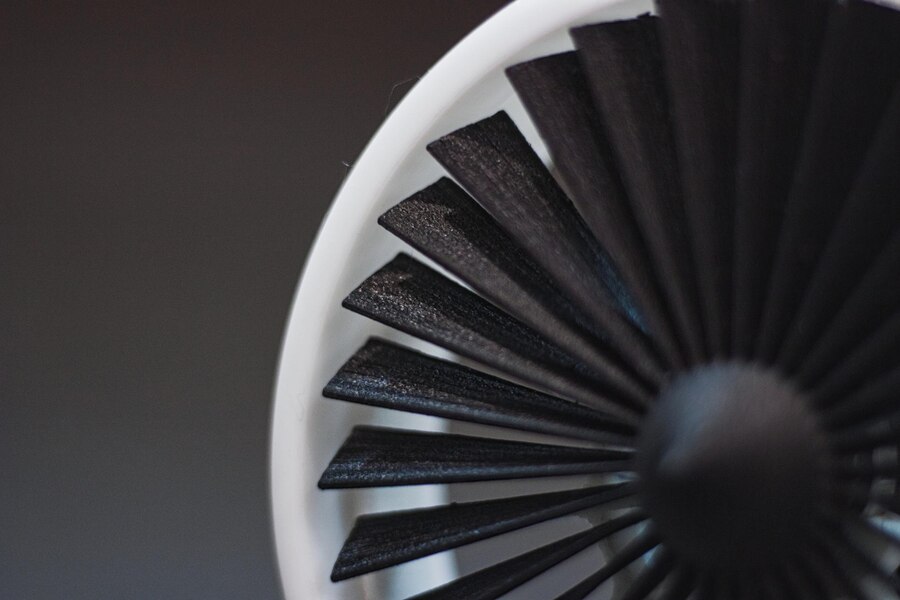 closeup shot table fan isolated black background
